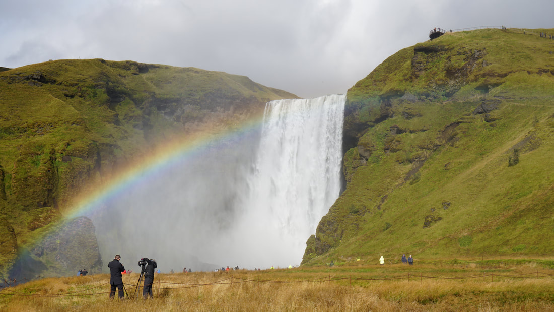Skógafoss waterfall with a rainbow